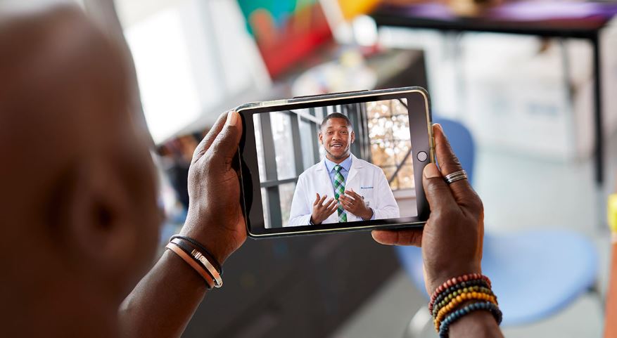 patient video visit with physician on smartphone