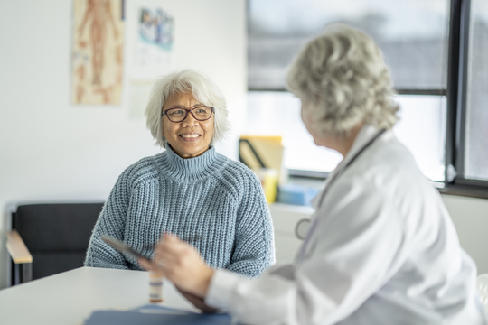 Older adult with care team member